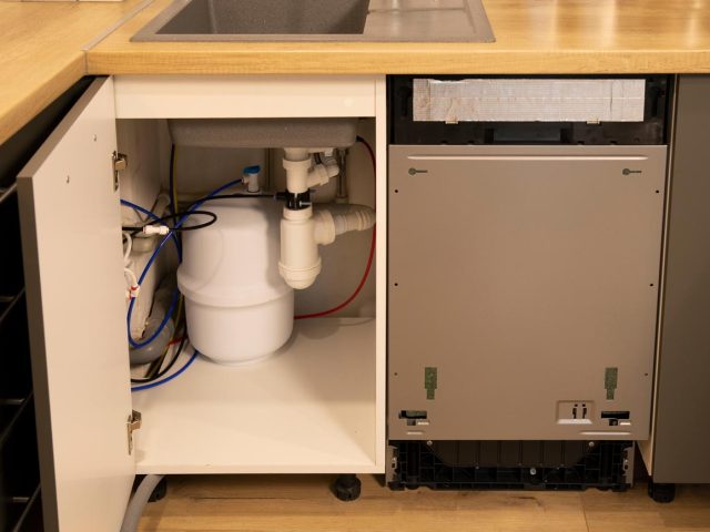 Why the Dishwasher Backs Up Into the Sink (And What’s Really Going On Under There)